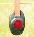 Fence Alert Warning Light on fence with farm background