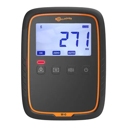 A Gallagher W-0 digital scale with a black face, orange border, and a blue backlit LCD screen showing '27.1 KG'.